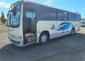 2012 Hino Melpha exterior view of the passenger entry door.