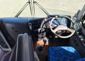 2012 Hino Melpha interior view of the driver's seat and steering wheel.