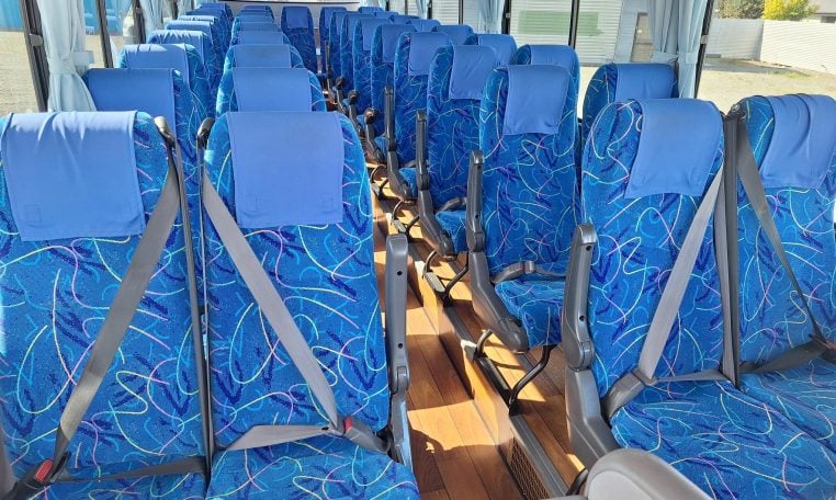 2012 Hino Melpha interior view of the passenger's seatbelts.