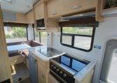 2015 Kea Horizon M721 interior view showing the overhead storage in the kitchen.