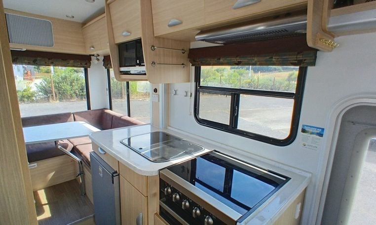 2015 Kea Horizon M721 interior view showing the overhead storage in the kitchen.