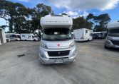 Front view of a 2017 Auto-Trail Tribute 625 motorhome showing the cab and sleek exterior.