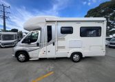 2017 Auto-Trail Tribute 625 side view with habitation door and awning providing entry and outdoor coverage.