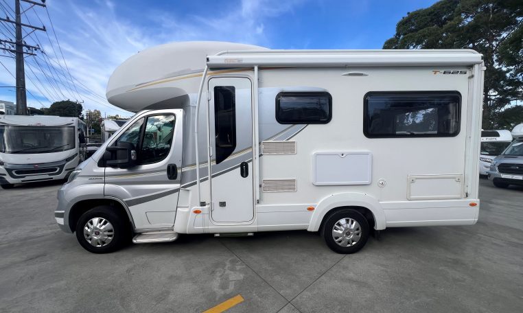 2017 Auto-Trail Tribute 625 side view with habitation door and awning providing entry and outdoor coverage.