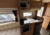 Compact 2017 Auto-Trail Tribute 625 motorhome kitchen with fridge, oven and smart storage cupboards