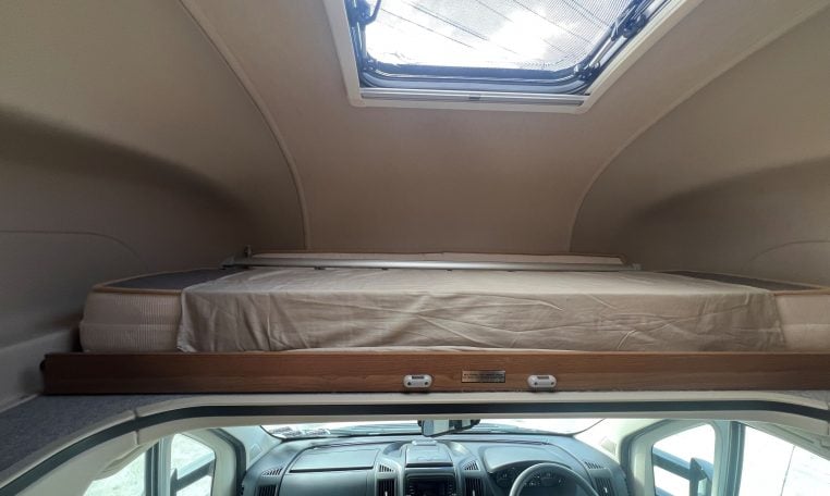 Bed over the cab in a 2017 Auto-Trail Tribute 625 motorhome, providing a comfortable sleeping area and smart use of space