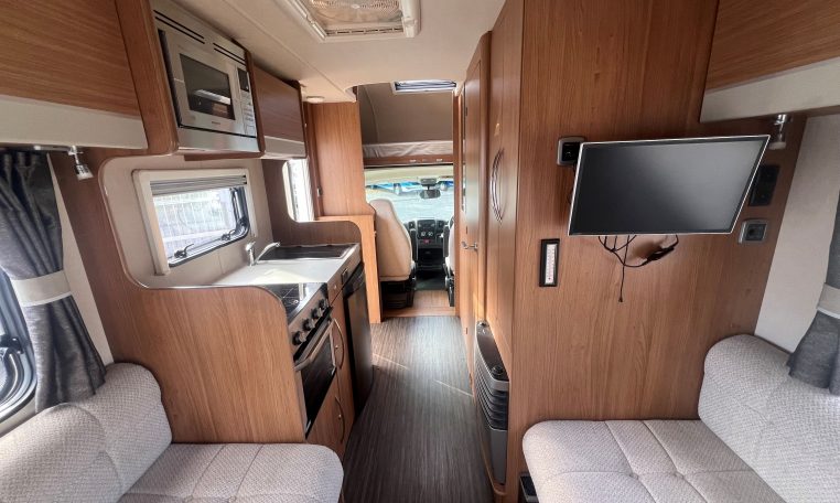 TV mounted inside a 2017 Auto-Trail Tribute 625 motorhome living area.