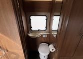 Clean, compact toilet setup in the 2017 Auto-Trail Tribute 625, designed for comfort and space efficiency.