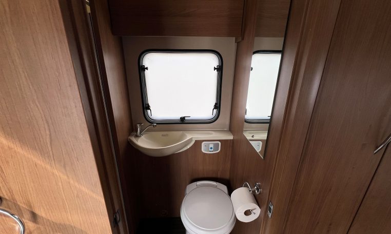 Clean, compact toilet setup in the 2017 Auto-Trail Tribute 625, designed for comfort and space efficiency.