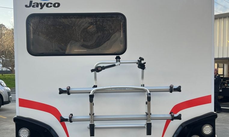 2017 Jayco Conquest FA24-1 exterior rear view with bike rack.
