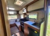 2018 Auto-Trail Imala 720 motorhome interior view showing the rear lounge and kitchen setup.