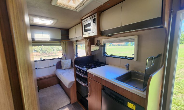 2018 Auto-Trail Imala 720 motorhome interior view showing the rear lounge and kitchen setup.