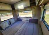 2018 Auto-Trail Imala 720 motorhome interior view showing the rear lounge converted into a bed.