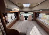 2018 Auto-Trail Tracker RS motorhome interior view of the living area converted into a bed.