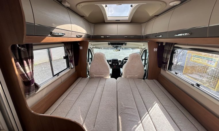 2018 Auto-Trail Tracker RS motorhome interior view of the living area converted into a bed.