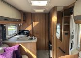 2018 Auto-Trail Tracker RS motorhome interior view showing the closed bathroom door creating privacy.