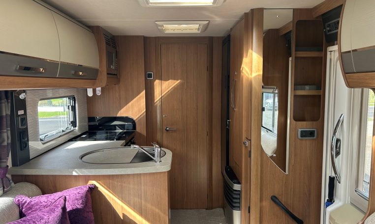 2018 Auto-Trail Tracker RS motorhome interior view showing the closed bathroom door creating privacy.