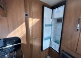 2018 Auto-Trail Tracker RS motorhome interior view showing the opened fridge.