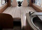 2018 Auto-Trail Tracker RS motorhome interior view showing the front lounge bed conversion.