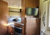 2018 Auto-Trail Tribute 715 motorhome interior view showing the TV in the living room.