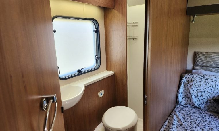 2018 Auto-Trail Tribute 715 motorhome interior view showing the compact toilet and handbasin setup.
