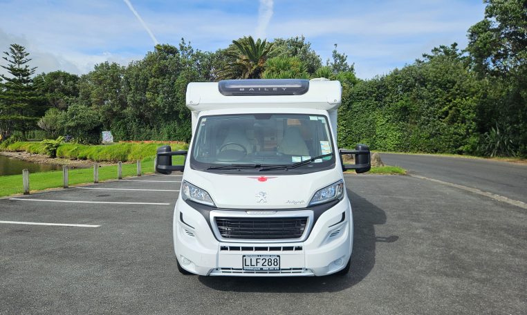 Front view of a 2018 Bailey Autograph 79-4T motorhome showing the cab and sleek exterior design.