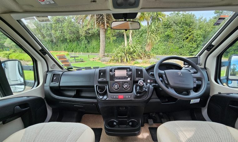 2018 Bailey Autograph 79-4T motorhome cab with dashboard layout, seating, and driving controls for comfort and functionality.