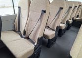 Toyota Coaster bus passenger seatbelts fitted to seating area for safe and secure travel