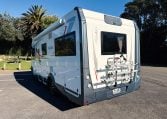 2018 Roller Team Pegaso 745 exterior showing the rear driver's side and bike rack.