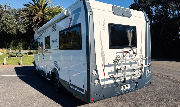 2018 Roller Team Pegaso 745 exterior showing the rear driver's side and bike rack.