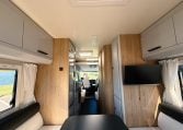 2018 Roller Team Pegaso 745 interior view of the hallway, TV, kitchen and cab.