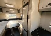 2018 Roller Team Pegaso 745 interior rear U-shaped lounge/dining and fridge.
