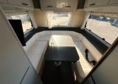 2018 Roller Team Pegaso 745 interior rear U-shaped lounge seating and table