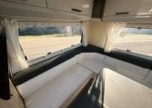 2018 Roller Team Pegaso 745 interior rear U-shaped lounge seating and windows