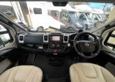 2019 Auto-Trail Frontier Delaware S interior view showing the front cab with steering wheel and dashboard.