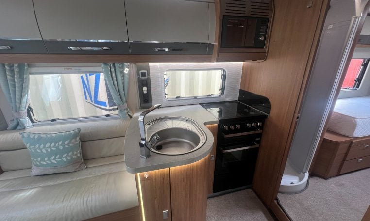 2019 Auto-Trail Frontier Delaware S interior view showing the central compact kitchen.