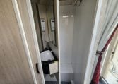 2019 Iveco Daily 50-210 interior view showing the split room divider in the bathroom.