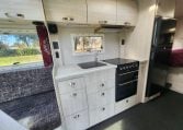 2019 Iveco Daily 50-210 interior view showing the kitchen with oven and grill.