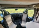 2019 Iveco Sunliner Switch interior view showing the cab with swivel seats.