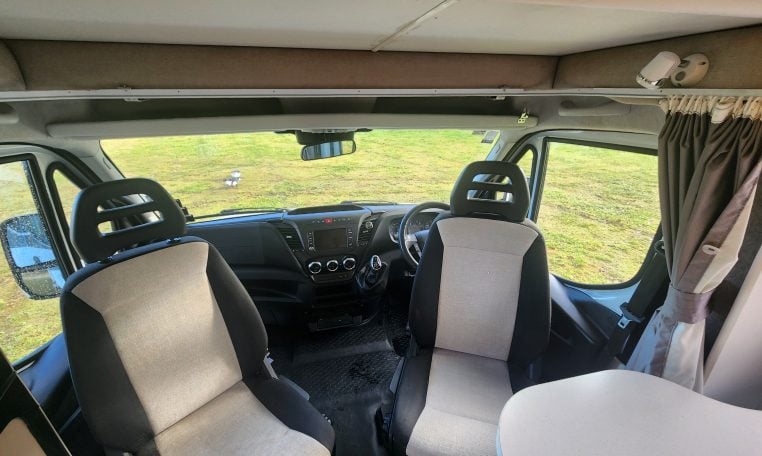 2019 Iveco Sunliner Switch interior view showing the cab with swivel seats.
