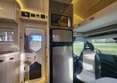 2019 Iveco Sunliner Switch interior view showing the fridge and microwave.