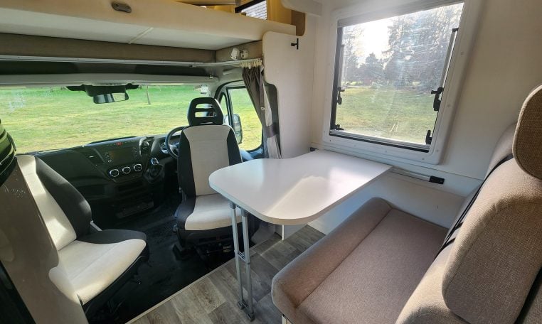 2019 Iveco Sunliner Switch interior view showing the front dining area.