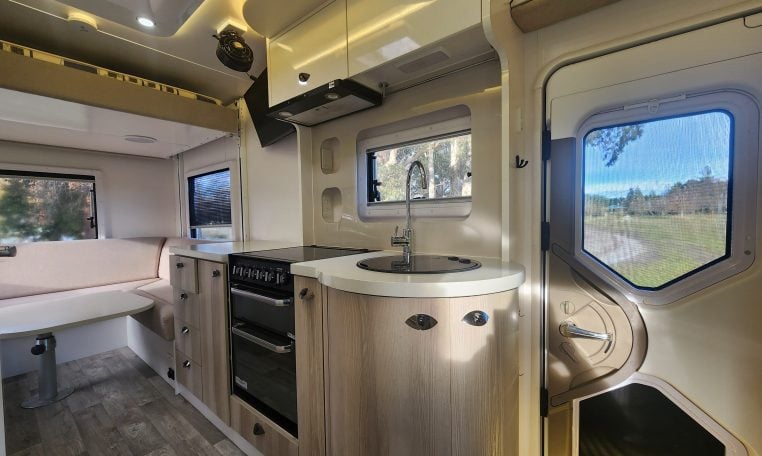 2019 Iveco Sunliner Switch interior view showing the central kitchen.