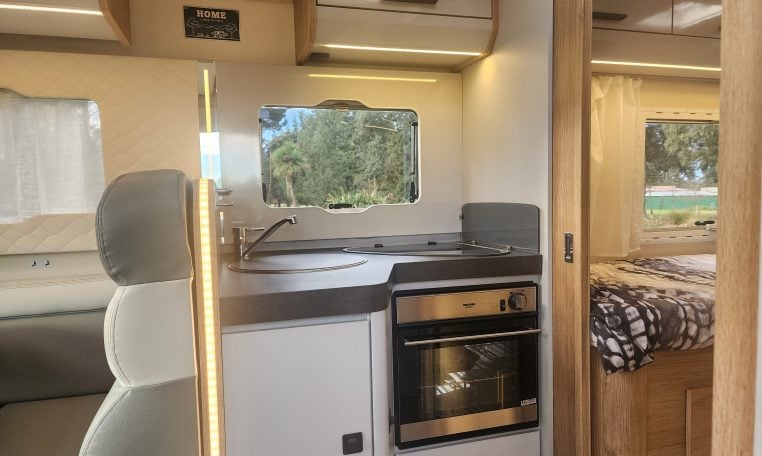 2019 Roller Team T-Line 785 interior view showing the kitchen with oven.