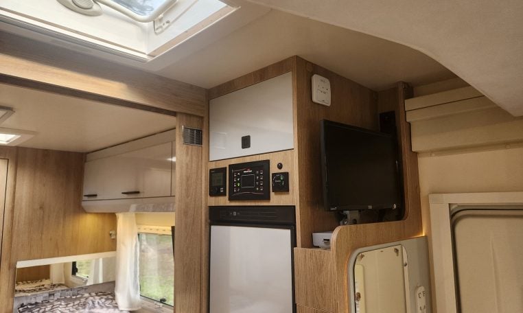 2019 Roller Team T-Line 785 interior view showing the TV and controls.