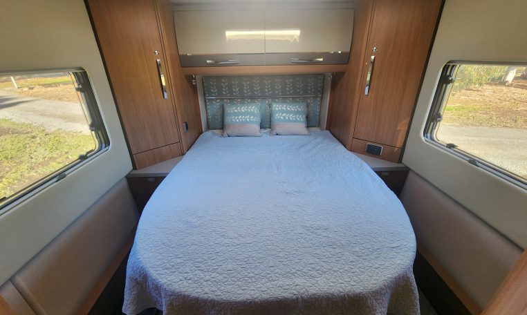 2020 Auto-Trail Delaware interior view showing the rear island bed in the bedroom.