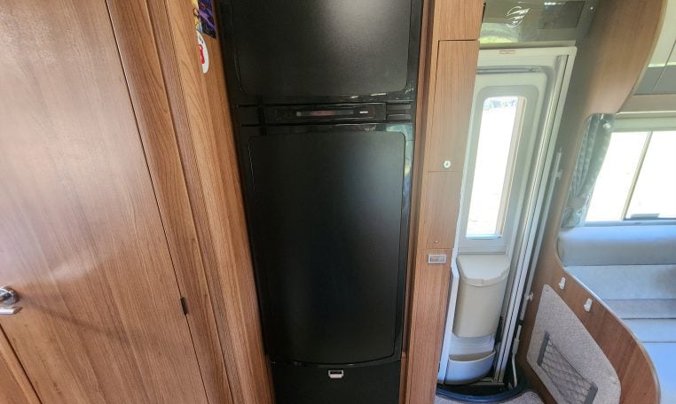 2020 Auto-Trail Delaware interior view showing the tall integrated fridge.