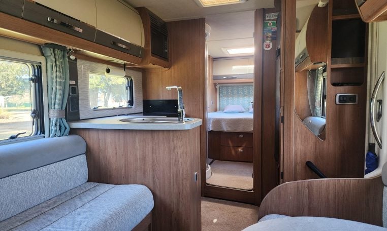 2020 Auto-Trail Delaware interior view showing the motorhome lounge and kitchen layout.