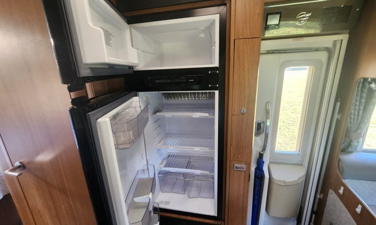 2020 Auto-Trail Delaware interior showing the fridge with doors open.