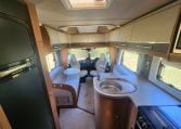2020 Auto-Trail Delaware interior view showing the motorhome kitchen and front lounge layout.